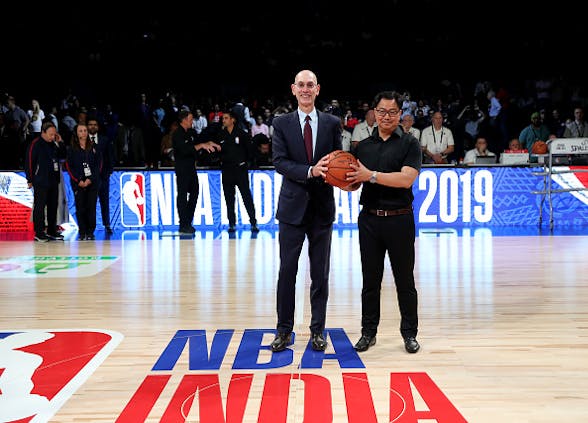 NBA Commissioner Adam Silver with Sports Minister of India, Kiren Rijiju during game in Mumbai on October 5, 2019 (Photo by Joe Murphy/NBAE via Getty Images)