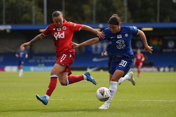 Sam Kerr of Chelsea is challenged by Natasha Harding of Reading during the FA Women's Super League match in May 2021. (by Harriet Lander - Chelsea FC/Chelsea FC via Getty Images).