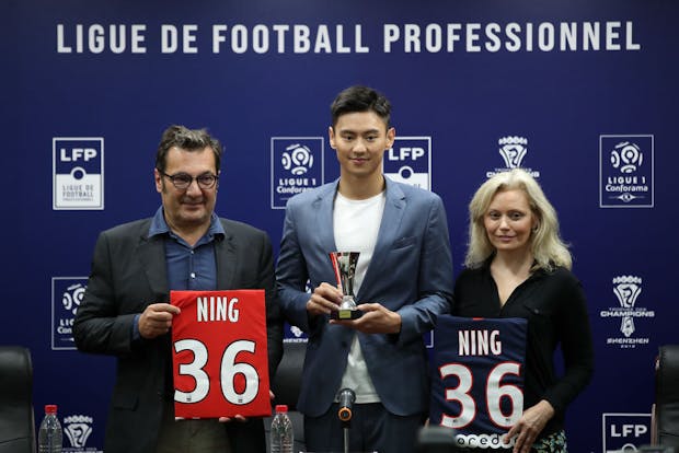French League Promotion Ambassador Ning Zetao (C) ahead of 2019 French Trophy of Champions match between Rennes and PSG in Shenzhen (Photo by Lintao Zhang/Getty Images)