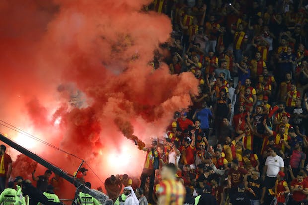 A flare is set off by Esperance Sportive de Tunis fans (Photo by Francois Nel/Getty Images)