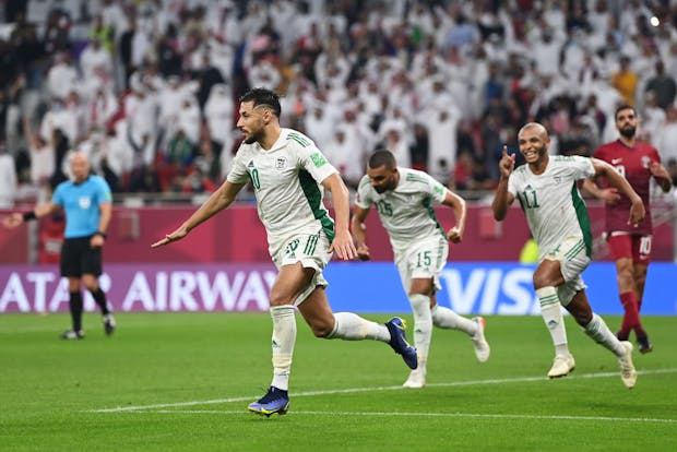 Mohammed Belaili of Algeria celebrates after scoring his team's second goal during the FIFA Arab Cup semi-final against Qatar (Photo by Shaun Botterill/Getty Images)