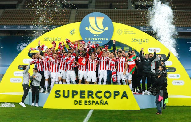 Athletic Bilbao lift 2020-21 Supercopa de Espana trophy following final vs Barcelona in Seville (Photo by RFEF - Pool/Getty Images)