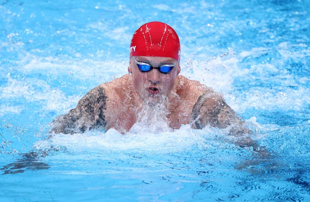 Adam Peaty of Team GB competes in the mixed 4 x 100m medley relay final at the Tokyo 2020 Olympic Games (by Ryan Pierse/Getty Images)