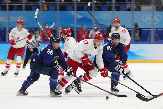 Sakari Manninen of Team Finland looks to control the puck (Photo by Harry How/Getty Images)