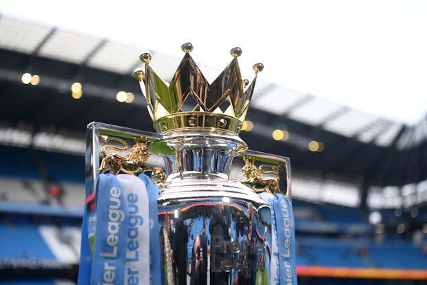 MANCHESTER, ENGLAND - JANUARY 15: A detailed view of the Premier League trophy on the pitch prior to the Premier League match between Manchester City  and  Chelsea at Etihad Stadium on January 15, 2022 in Manchester, England. (Photo by Michael Regan/Getty Images)