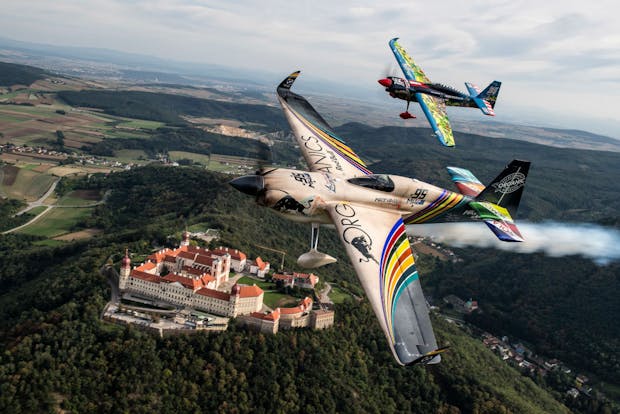 Matt Hall of Australia and Petr Kopfstein of the Czech Republic fly over the abbey of Göttweig the Wachau (Photo by Red Bull via Getty Images)