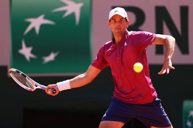 Dominic Thiem of Austria plays a forehand in his first round match against Pablo Andujar of Spain during Day One of the 2021 French Open (Photo by Julian Finney/Getty Images)