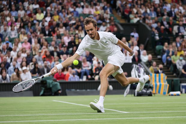 Daniil Medvedev in action at The Championships - Wimbledon 2021 (by Clive Brunskill/Getty Images)