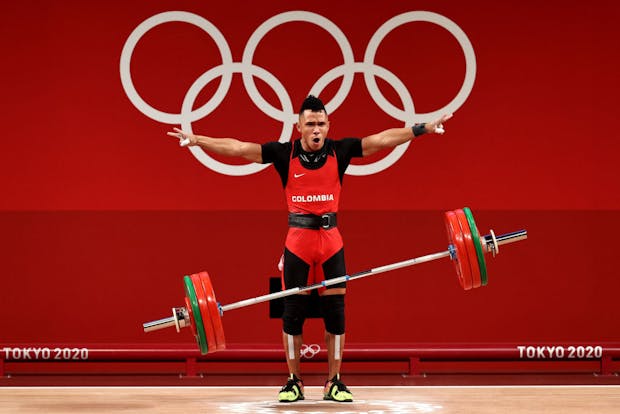 Luis Javier Mosquera Lozano of Team Colombia on his way to a silver medal during the Weightlifting - Men's 67kg competition at the Tokyo 2020 Olympic Games (by Chris Graythen/Getty Images)