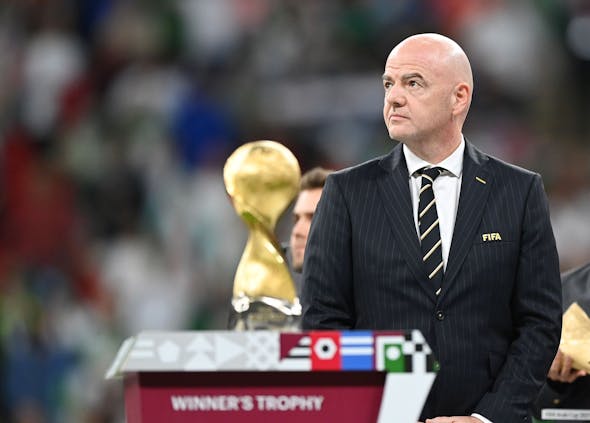 Fifa president Gianni Infantino looks on as the Fifa Arab Cup trophy is awarded following the final match between Tunisia and Algeria. (Photo by Shaun Botterill/Getty Images).