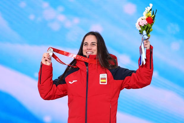 Silver medallist, Queralt Castellet, celebrates Spain's only medal of the 2022 Winter Olympic Games following the women's snowboard halfpipe final (by Cameron Spencer/Getty Images)