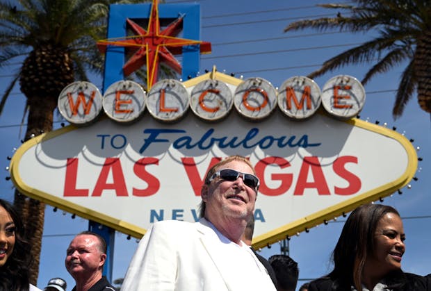 Las Vegas Raiders owner Mark Davis in front of the famed Las Vegas welcome sign. (Photo by David Becker/Getty Images)