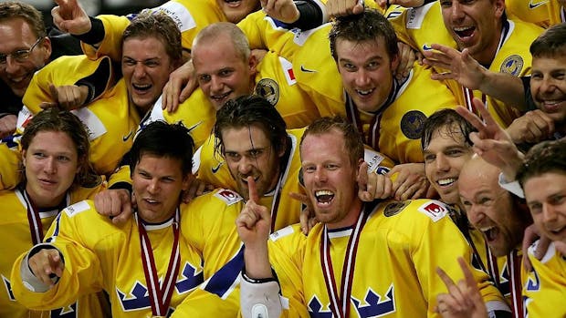 Team Sweden celebrate their 4-0 victory over the Czech Republic after receiving their gold medals for the IIHF World Championship at Riga Arena in 2021. (Photo by Doug Pensinger/Getty Images)