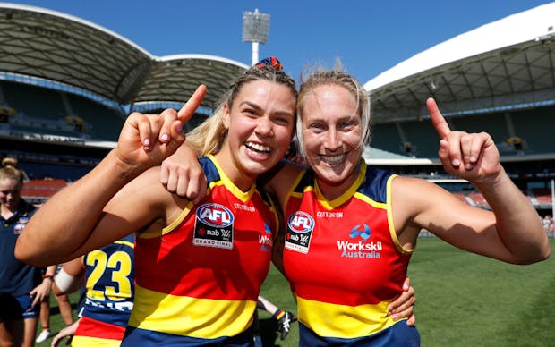 Anne Hatchard and Marijana Rajcic of the Adelaide Crows celebrate winning the 2022 AFLW Grand Final. (Photo by Dylan Burns/AFL Photos via Getty Images)