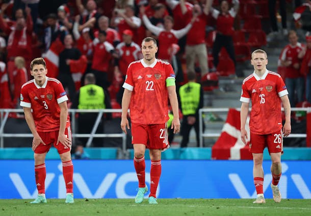 Russian players look on after Denmark scores its fourth goal during their Uefa Euro 2020 Group B match. (Photo by Wolfgang Rattay - Pool/Getty Images)