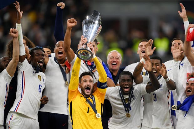 Hugo Lloris of France lifts the trophy following his team's victory in the Uefa Nations League 2021 final against Spain (by Mike Hewitt/Getty Images)