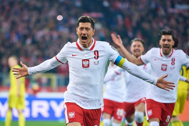 Robert Lewandowski from Poland celebrates after scoring during 2022 FIFA World Cup vs. Sweden (Photo by Adam Nurkiewicz/Getty Images)