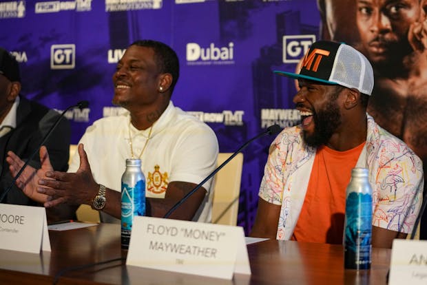 Floyd Mayweather and Don Moore laugh during a press conference at The Gabriel Miami Downtown (Photo by Eric Espada/Getty Images)