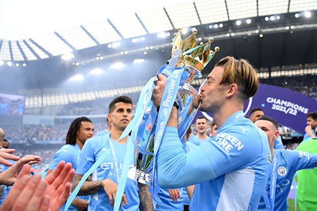 Manchester City and England star Jack Grealish kissing the Premier League trophy. (Photo by Michael Regan/Getty Images)