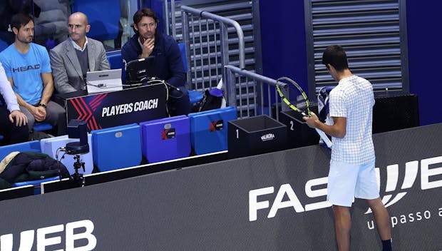 Carlos Alcaraz takes a break close to coach Juan Carlos Ferrero at the Next Gen ATP Finals. (Photo: Julian Finney/Getty Images).