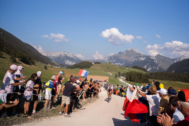 Fans cheering the riders of the 2020 Tour de France on the Plateau des Glieres in Petit-Bornand-les-Glieres, France (by Julien Goldstein/Getty Images)