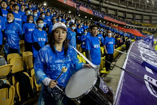 Wuhan Three Towns FC fans attend a China League One match against Beijing Institute of Technology FC. (Photo by Getty Images)