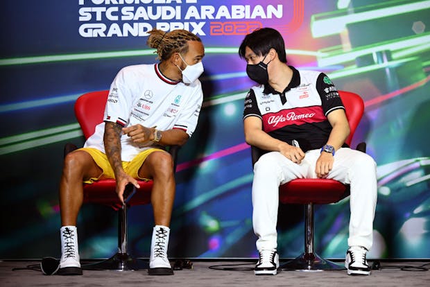 Lewis Hamilton and Zhou Guanyu at the F1 Grand Prix of Saudi Arabia, March 2022. (Photo by Clive Mason/Getty Images)