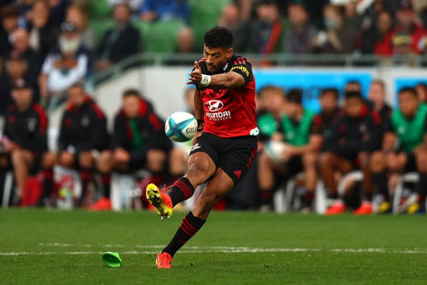 Richie Mo'unga of the Crusaders kicks a goal during the round 10 Super Rugby Pacific match against the Melbourne Rebels (Photo by Graham Denholm/Getty Images)