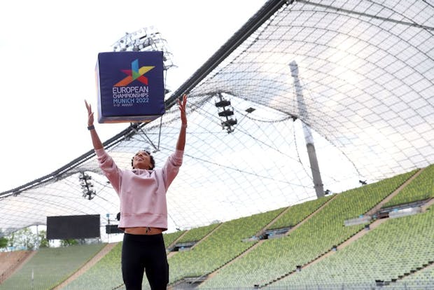 Olympic long jump champion Malaika Mihambo poses at Olympiastadion at Munich 2022 media event (by Alexander Hassenstein/Getty Images)