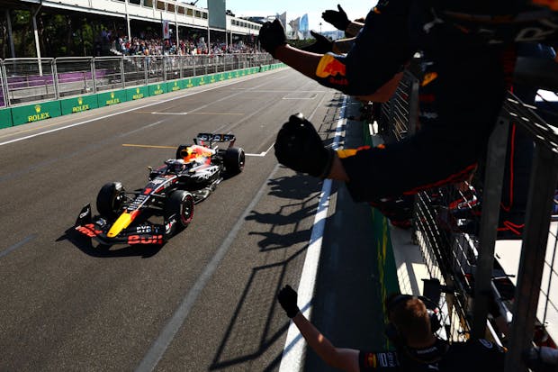 Race winner Max Verstappen of Red Bull Racing takes the chequered flag during the 2022 Azerbaijan Grand Prix (by Mark Thompson/Getty Images)