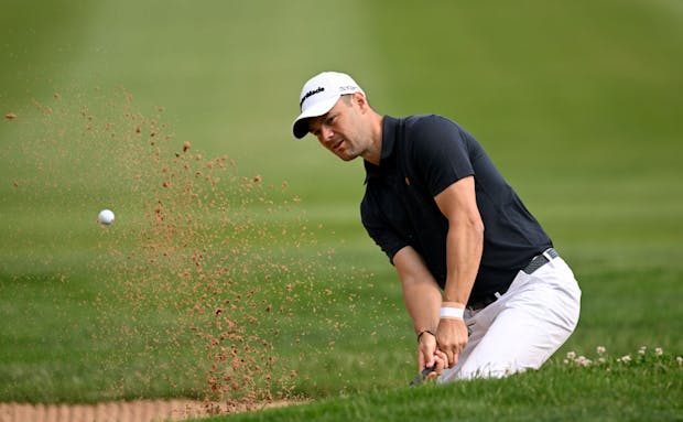 Martin Kaymer of Germany plays a bunker shot on the 13th hole during the second round of the BMW International Open (Photo by Stuart Franklin/Getty Images)