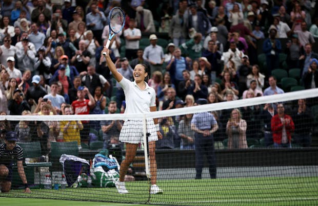Harmony Tan of France celebrates after beating Serena Williams in the women's singles first round at the 2022 Wimbledon Championships (by Clive Brunskill/Getty Images).