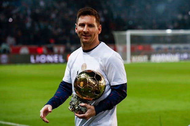 Lionel Messi celebrates his seventh Ballon d'Or award in December 2021 (by Catherine Steenkeste/Getty Images)