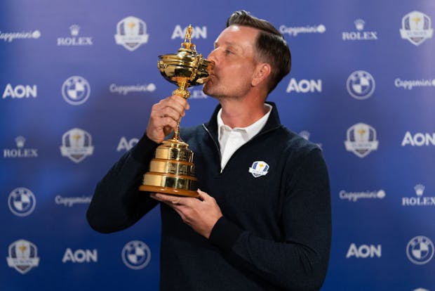European Ryder Cup captain, Henrik Stenson, poses for a portrait with the trophy (by Hailey Garrett/Getty Images)