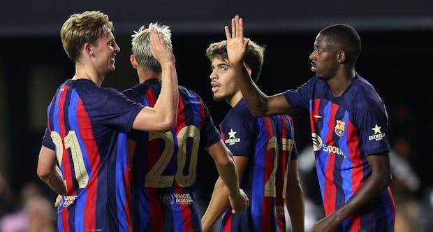 Ousmane Dembele of FC Barcelona celebrates with Frenkie de Jong (Photo by Michael Reaves/Getty Images)