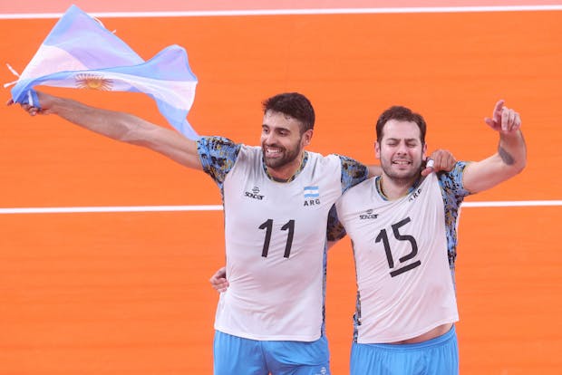 Sebastian Sole #11 and Luciano de Cecco #15 of Team Argentina celebrate winning the Men's Volleyball Bronze Medal Match at the Tokyo 2020 Olympic Games (by Chris Graythen/Getty Images)