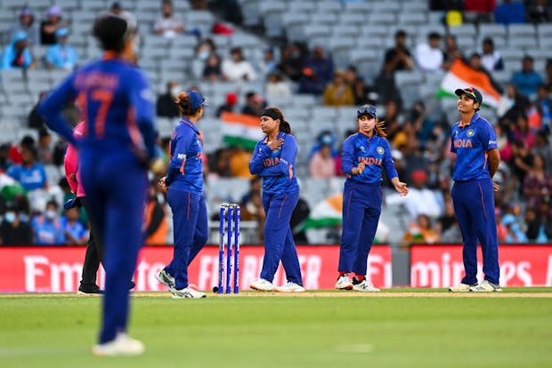 Action from the 2022 ICC Women's Cricket World Cup match between India and Australia in Auckland. (Photo by Hannah Peters/Getty Images)