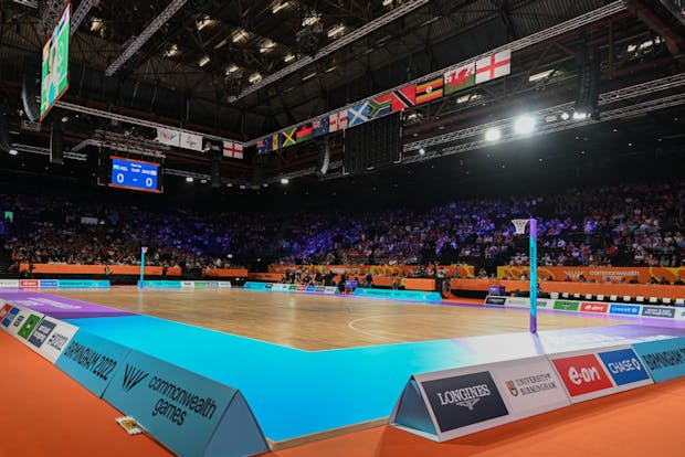 Sponsors logos on view beside Birmingham 2022 netball court at NEC Arena (Photo Sue McKay/Getty Images)