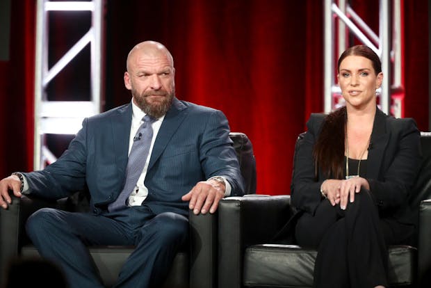 Paul "Triple H" Levesque, World Wrestling Entertainment head of creative and talent, and Stephanie McMahon, WWE co-chief executive.  (Photo by Frederick M. Brown/Getty Images)