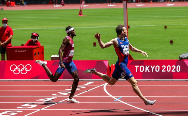 Karsten Warholm of Team Norway runs a new world and Olympic record of 45.94 seconds in the men's 400m hurdles at the Tokyo 2020 Olympic Games (by Roger Sedres/Gallo Images)