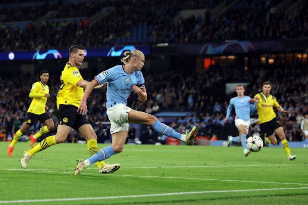 Erling Haaland of Manchester City shoots during the Uefa Champions League group G match against Borussia Dortmund (Photo by Marc Atkins/Getty Images)