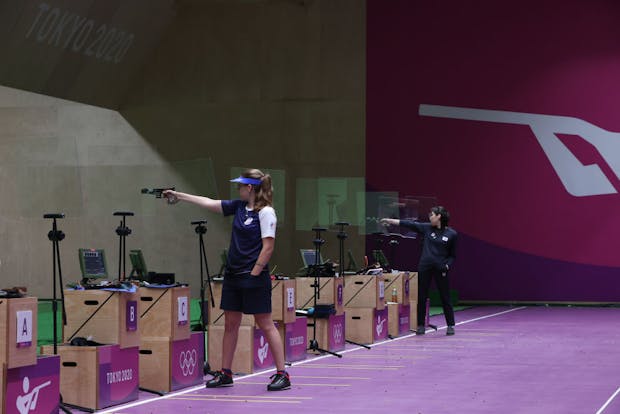 (L-R) gold medalist Vitalina Batsarashkina of Team ROC and silver medalist Minjung Kim of Team South Korea compete in the 25m Pistol Women's Finals at the Tokyo 2020 Olympic Games (by Kevin C. Cox/Getty Images)
