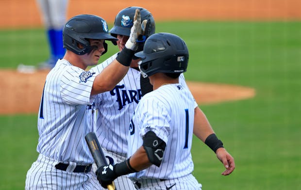 Players for Minor League Baseball's Tampa Tarpons in a 2022 game. (Photo by Mike Ehrmann/Getty Images)