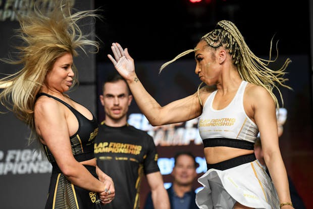 Julia Kruzer slaps Adrianna “Flychanelle” Śledź during the Slap Fighting Championships at the Arnold Sports Festival in Columbus, Ohio (Credit: Getty Images)