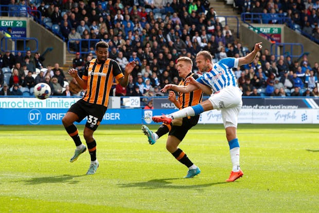 Jordan Rhodes of Huddersfield Town shoots during the Sky Bet Championship game against Hull City (Photo by John Early/Getty Images)