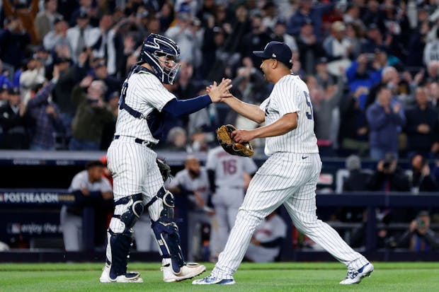 The New York Yankees celebrate their win over the Cleveland Guardians in Major League Baseball's Division Series. (Photo by Sarah Stier/Getty Images)
