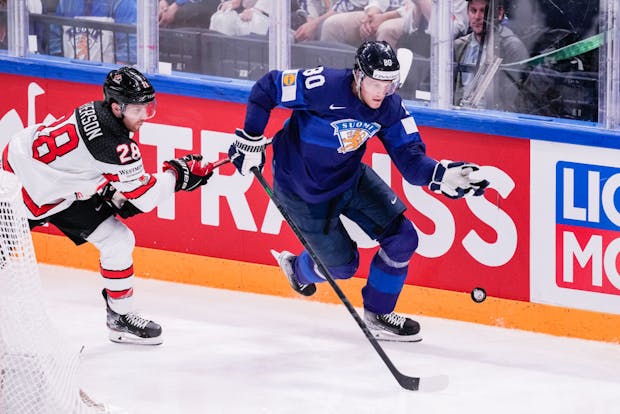 Saku Maenalanen of Finland (R) and Damon Severson of Canada (L) during the 2022 IIHF World Championship final (Jari Pestelacci/Eurasia Sport Images/Getty Images)