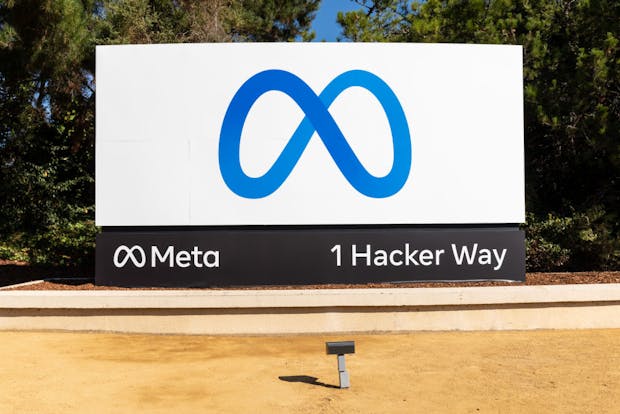Meta logo on display at company HQ. (Photo by Kelly Sullivan/Getty Images for Facebook)