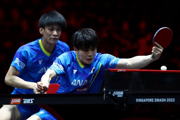 Yukiya Uda (R) and Shunsuke Togami of Japan in action during WTT Singapore Smash at OCBC Arena on March 18, 2022 (Photo by Yong Teck Lim/Getty Images)