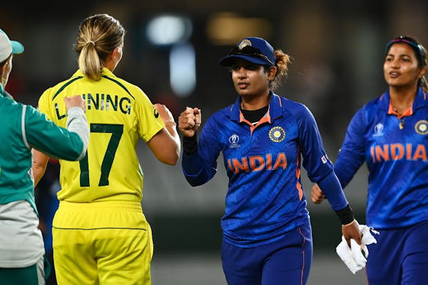 Meg Lanning of Australia and Mithali Raj of India at the 2022 ICC Women's Cricket World Cup. (Photo by Hannah Peters/Getty Images)